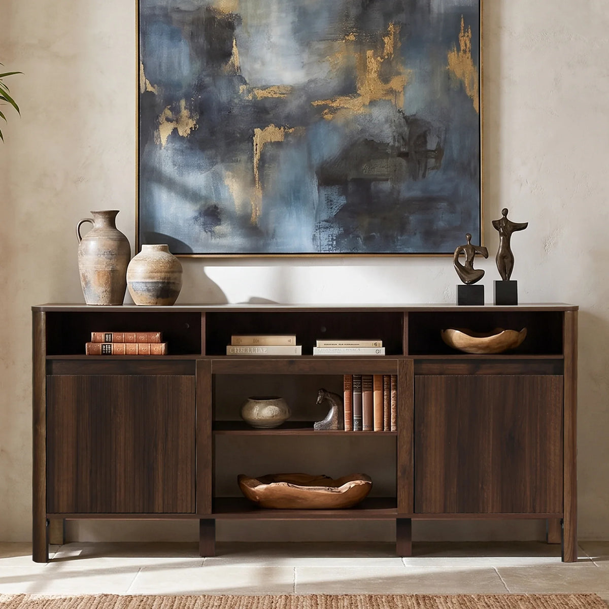 Modern dark wood sideboard with decorative vases and abstract art painting above