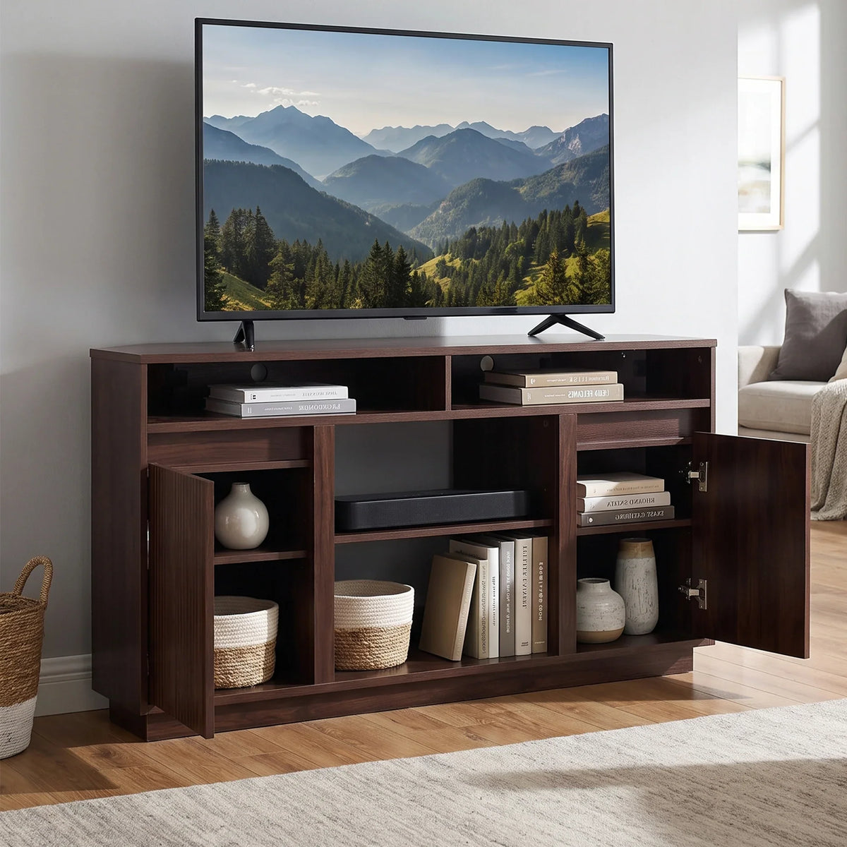 Modern dark wood TV stand with open shelves and cabinets in a bright living room